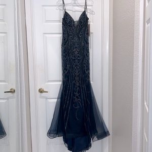 Brand New with tags stunning Navy beaded gown. Lightweight and comfortable.